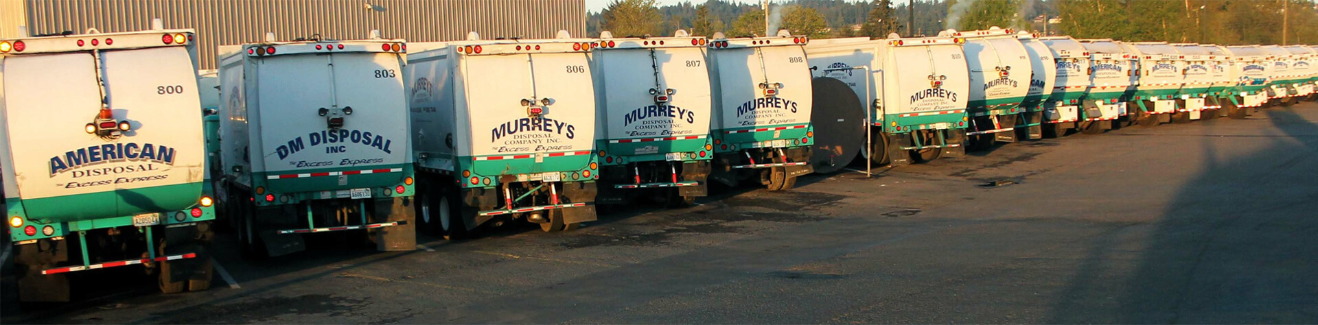 Waste Connections - Murrey Disposal waste hauling trucks.